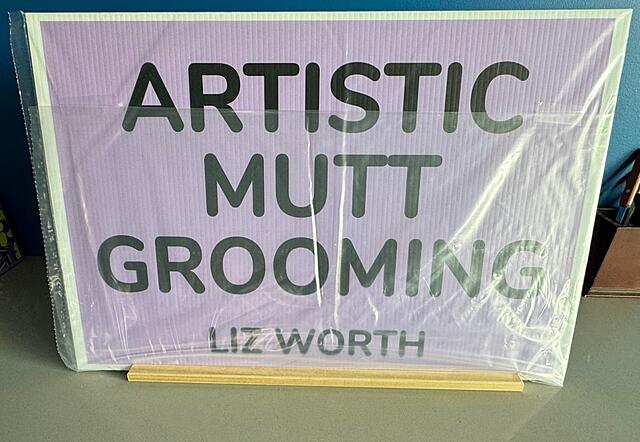 Here is the sign holder in use, with the sign still in its protective covering.