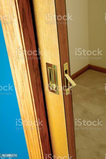Click image for larger version  Name:	open-wooden-pocket-door-slid-back-into-the-wall-picture-id841680174?s=612x612.jpg Views:	0 Size:	33.8 KB ID:	849251