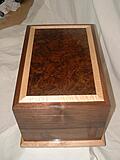 Click image for larger version

Name:	Black Walnut and Burl top.JPG
Views:	273
Size:	35.2 KB
ID:	788722