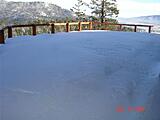 Snow on the deck, railing is 3.5 ft high