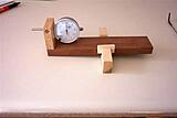 This is the complete jig.  The light colored piece goes in the miter slot.  It must be sized exactly.  Best to use hardwood of some type.