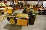06 The table saw is surrounded by the shaper and planer so they all share the same dust collector.