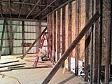 Wall with the entrance to the wood shop area.