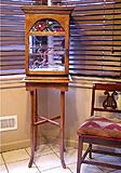 QS white oak cage for our canary.
This cage is bigger than the walnut
cage, again, the front is glass.