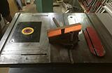 close up of cast iron wing and miter guage
