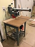 Repaired saw with a new table